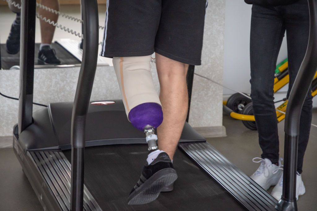 An amputee walking on a treadmill at the UNBROKEN center, in Lviv, Ukraine