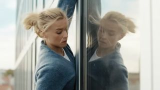 Jeanne Goursaud on a building in Exterritorial. 