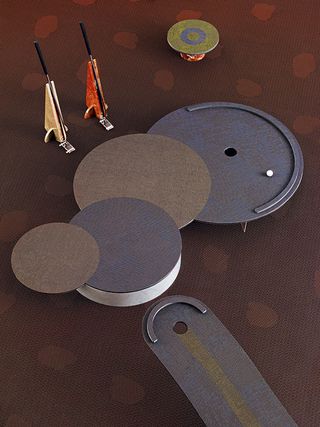 futuristic round of minigolf, featuring abstract shapes and contrasting materials