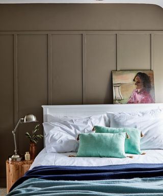 bedroom with light brown panelled wall