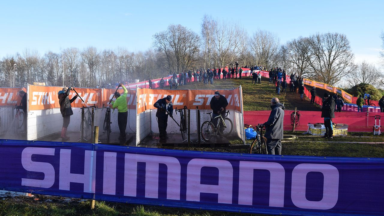 The pits have multiple jet washes to clean bikes mid race