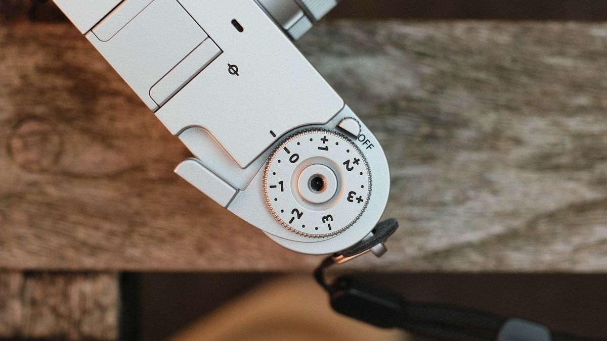 Fujifilm X Half camera on a wooden bench