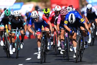 MOLINA DE ARAGON SPAIN AUGUST 17 Fabio Jakobsen of Netherlands and Team Deceuninck QuickStep sprints to win ahead of Arnaud Demare of France and Team Groupama FDJ and Magnus Cort Nielsen of Denmark and Team EF Education Nippo during the 76th Tour of Spain 2021 Stage 4 a 1639km stage from El Burgo de Osma to Molina de Aragn 1134m lavuelta LaVuelta21 on August 17 2021 in Molina de Aragn Spain Photo by Stuart FranklinGetty Images