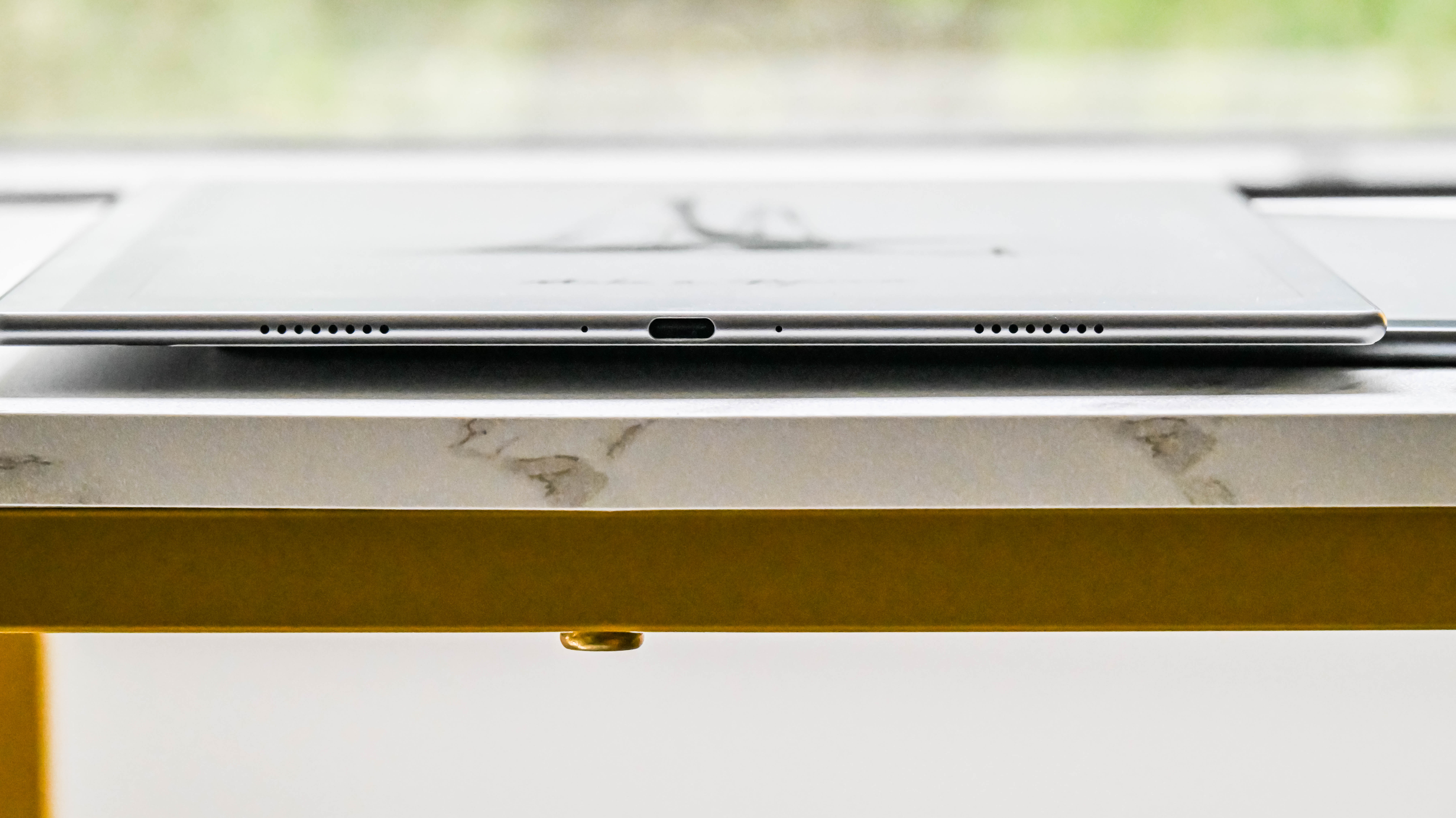 The USB-C port and speaker grille on the lower edge of the Onyx Boox Go 10.3 tablet