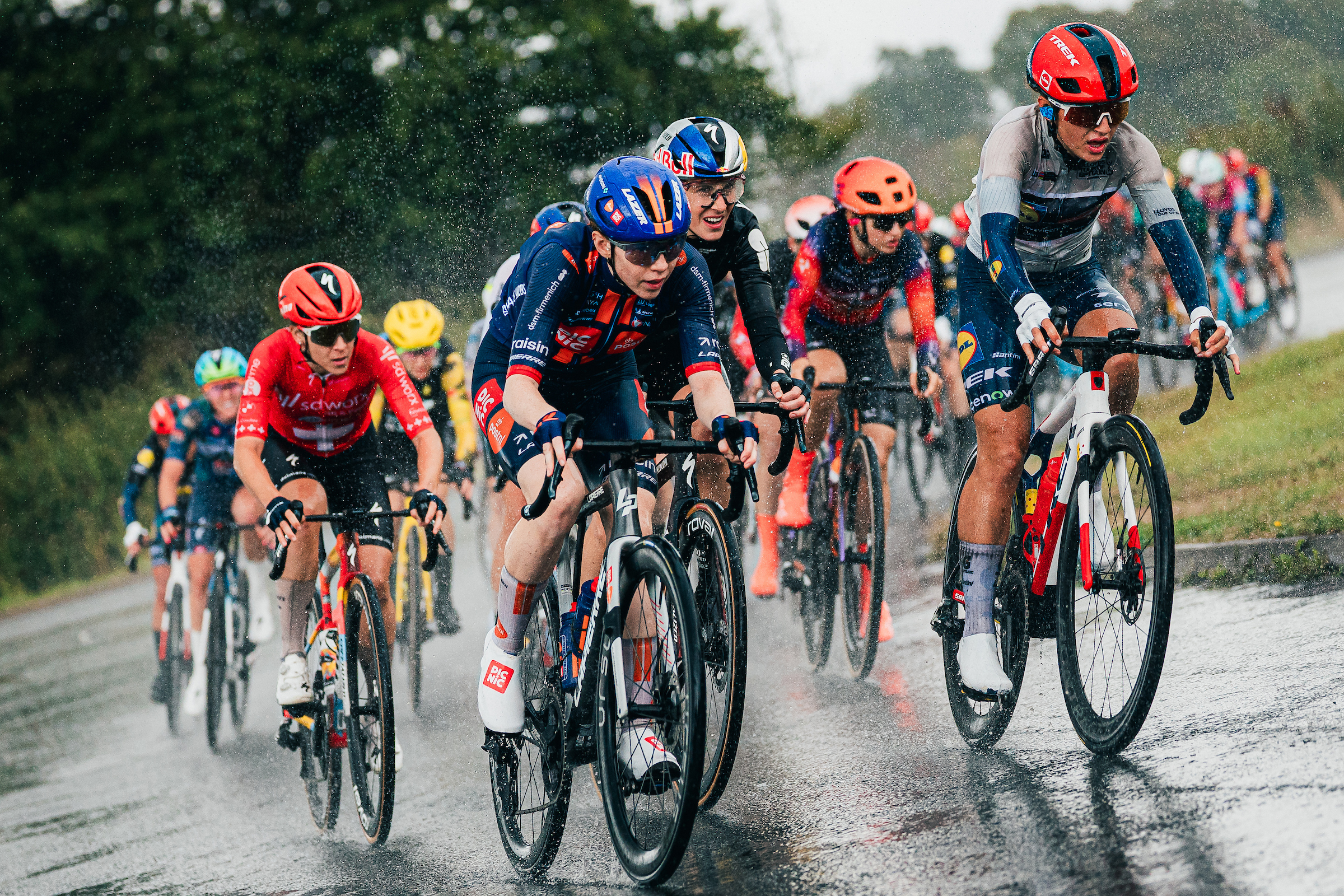 Josie Nelson racing alongside Fleur Moors through the rain on the second stage of the 2026 Tour of Britain Women