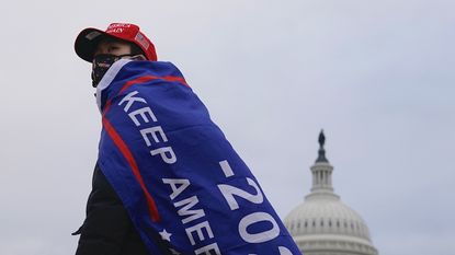 A supporter of US President Donald Trump outside the US Capitol.