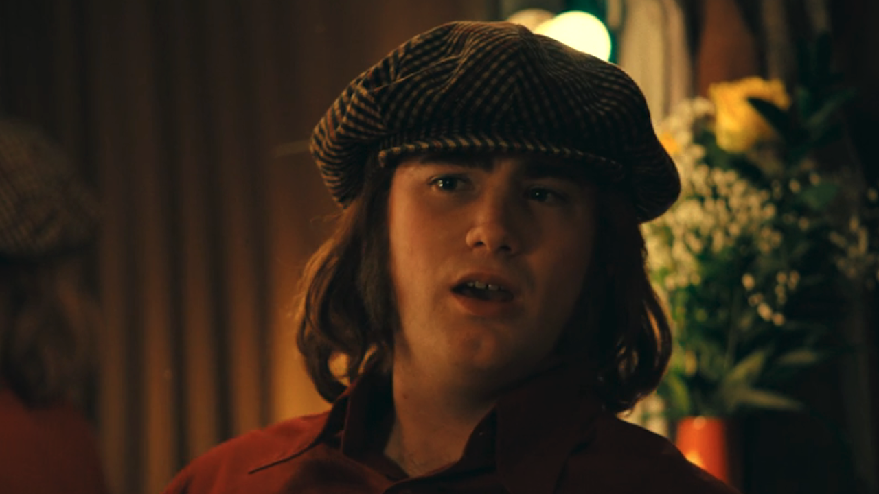 Alistair Mumford as Elton John in Ponies Season 1 finale