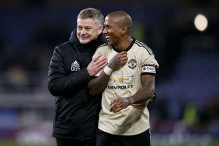 Ole Gunnar Solskjaer, left, wants to keep Ashley Young at Old Trafford