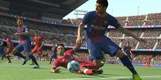 A player charges down the field in PES.