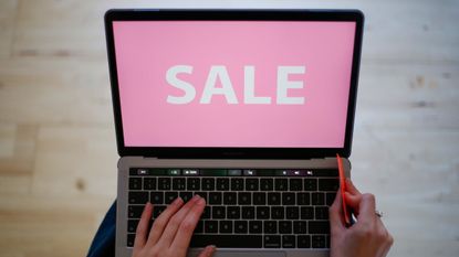 Best Boxing Day sales, woman shopping on laptop