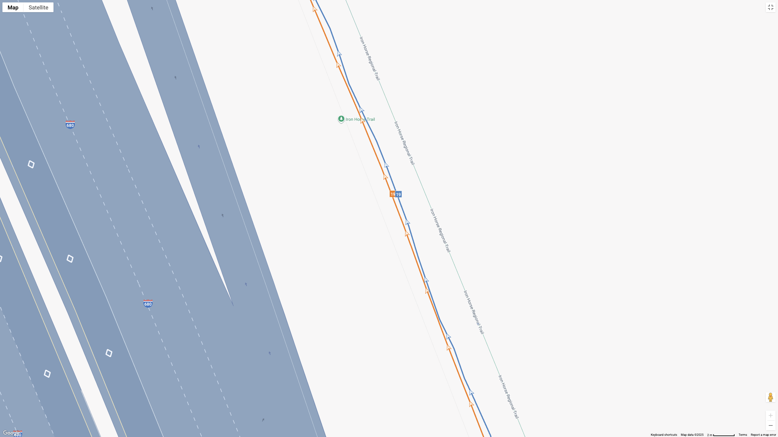 A Google Maps map view showing GPS location data for a workout, with the COROS APEX 4 (orange line) and Garmin Forerunner 970 (blue line) showing how their dual-band GPS tracking compares.