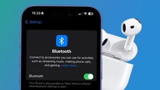 An iPhone on a blue background next to a pair of AirPods