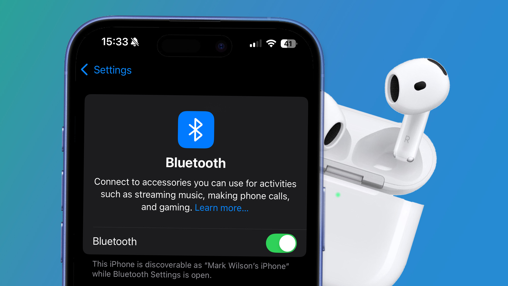 An iPhone on a blue background next to a pair of AirPods
