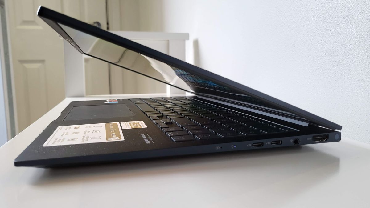 Asus Zenbook OLED 15 (2023) on a shelf