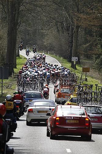 The peloton through the Ardennes countryside