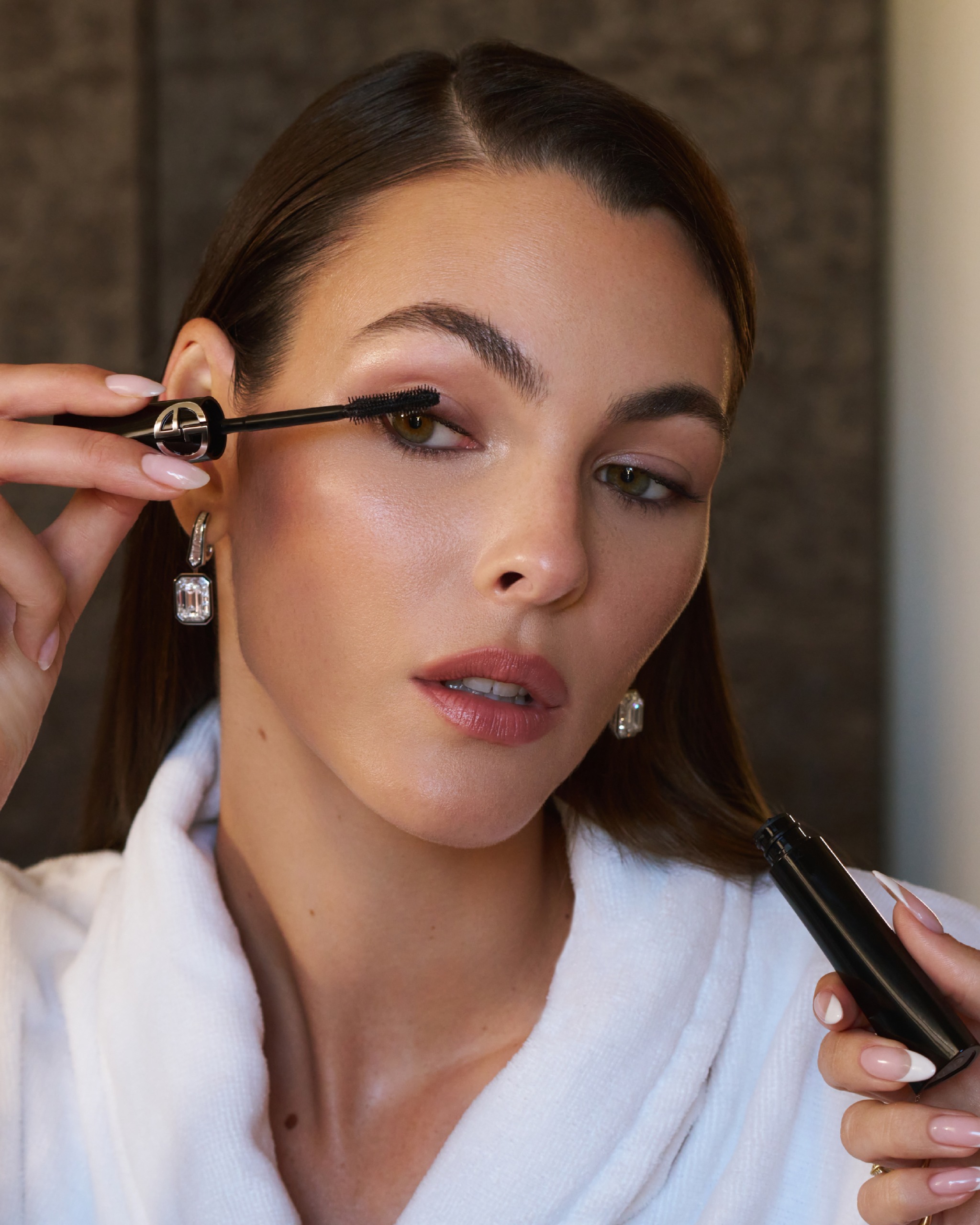 Vittoria Ceretti applying Armani Beauty make-u