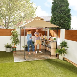 garden with bar and tiles flooring and grass