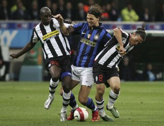 Juventus pair Mohamed Sissoko and Mauro Camaronesi challenge Inter's Zlatan Ibrahimovic in a Serie A match in 2008.
