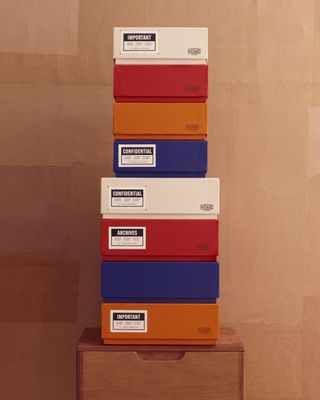 Stacked colourful office storage boxes by Zara Home