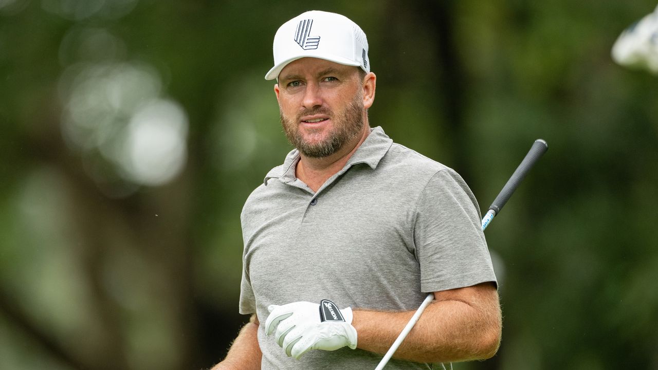 Graeme McDowell with a LIV Golf League cap on and a putter tucked under his arm at the recent Hong Kong Open on the Asian Tour