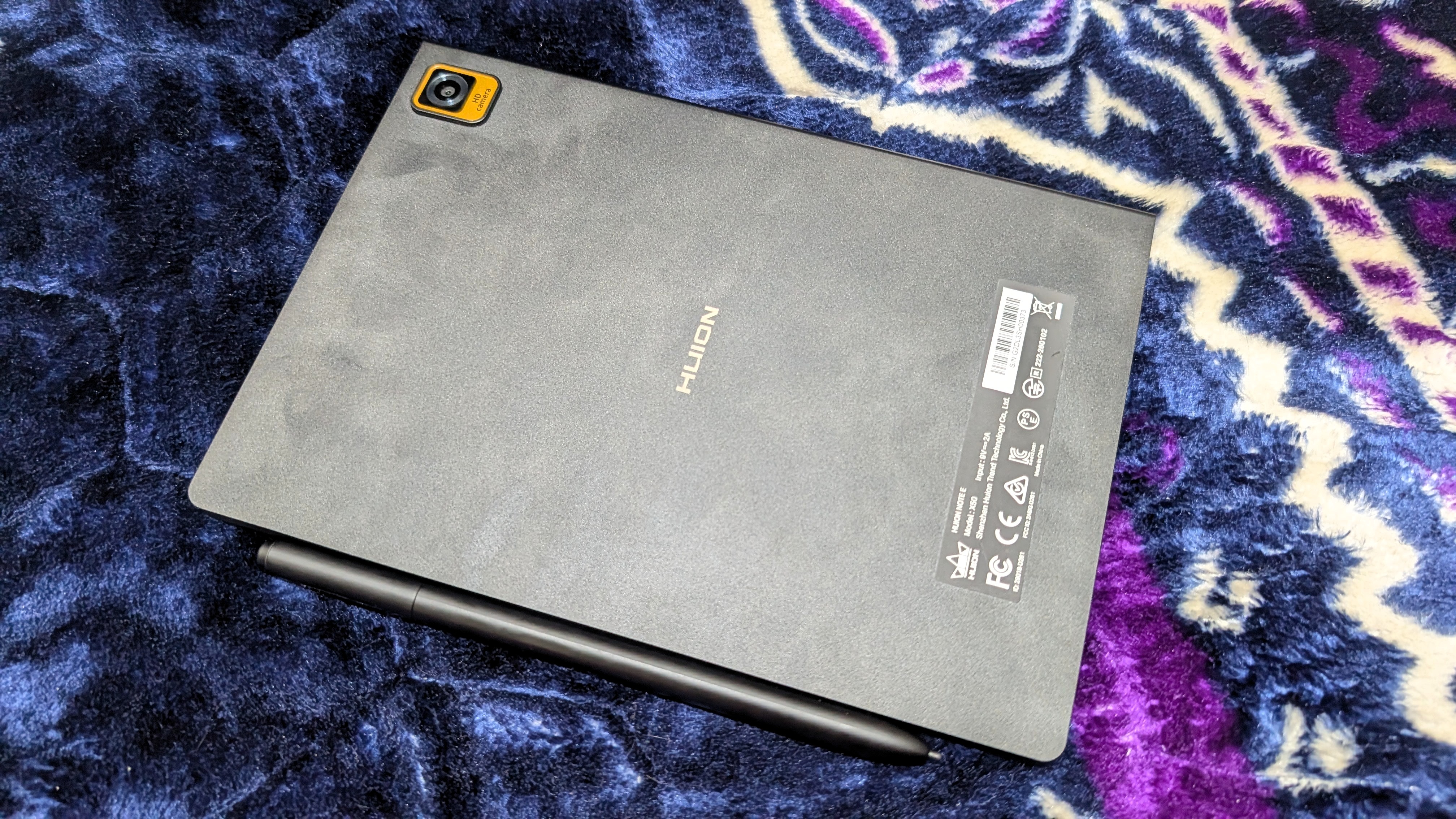 Huion Note E Android tablet with a stylus and paper-like display