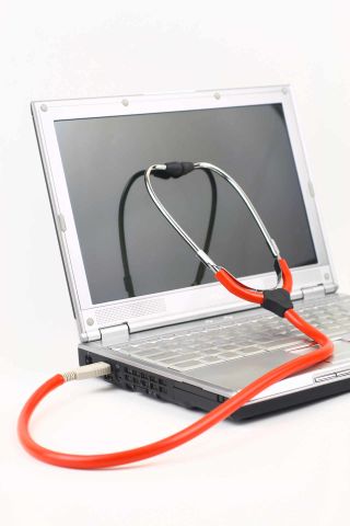 Stethoscope connected to laptop computer via USB port