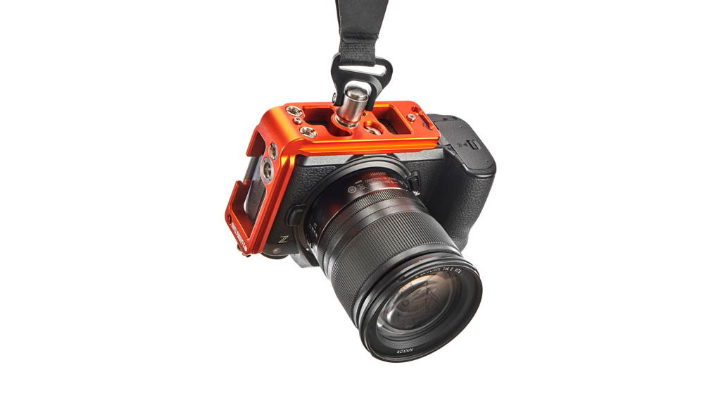 3 Legged Thing Zadie QD in Copper colorway attached to Nikon Z6 III camera hanging from strap