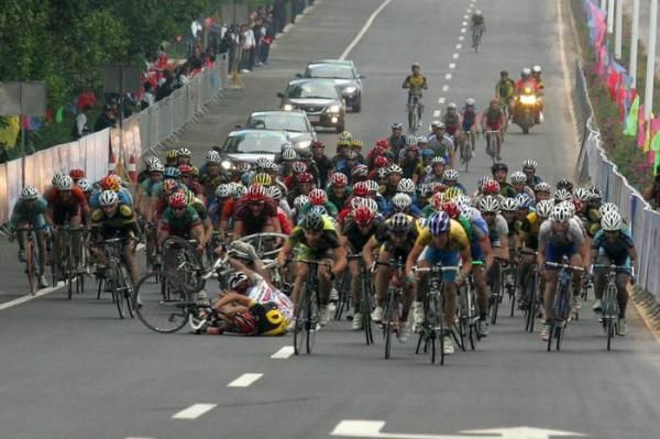 Riders go down at high speed.