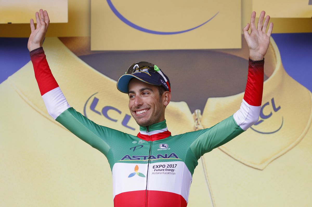 Italian champion Fabio Aru on the jersey about to collect his second yellow jersey