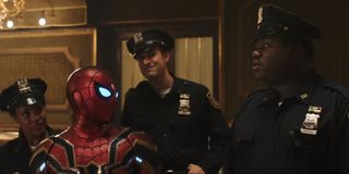 Spider-Man with cops in the Far From Home Trailer