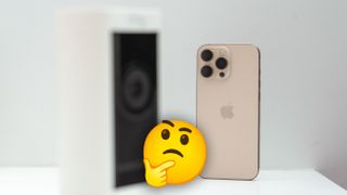 Out of focus Ring camera next to iPhone