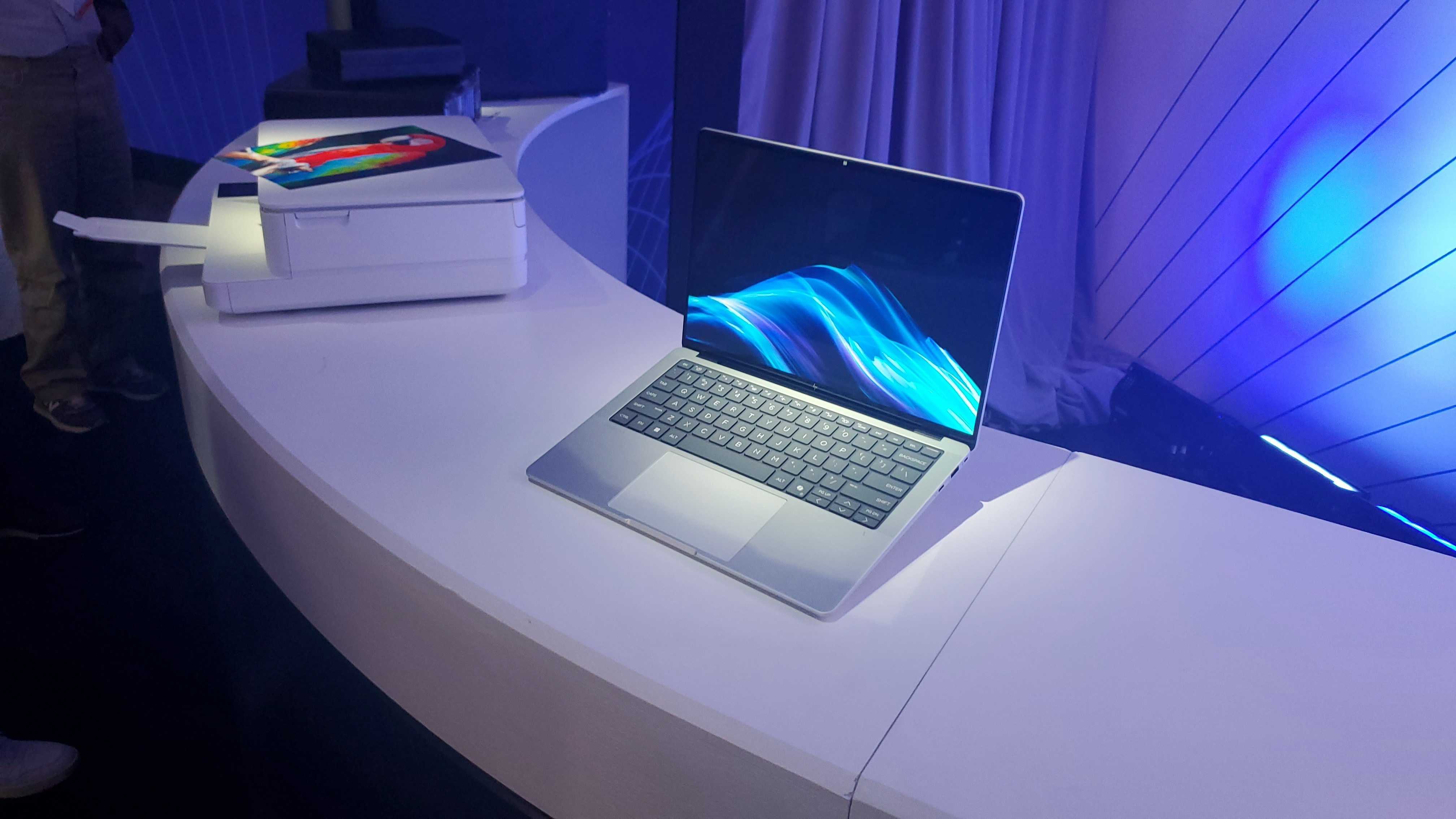 HP EliteBook X laptop open on a table