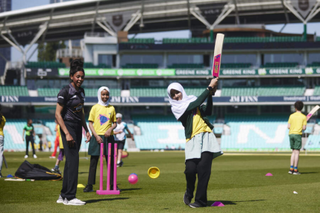 girls playing cricket