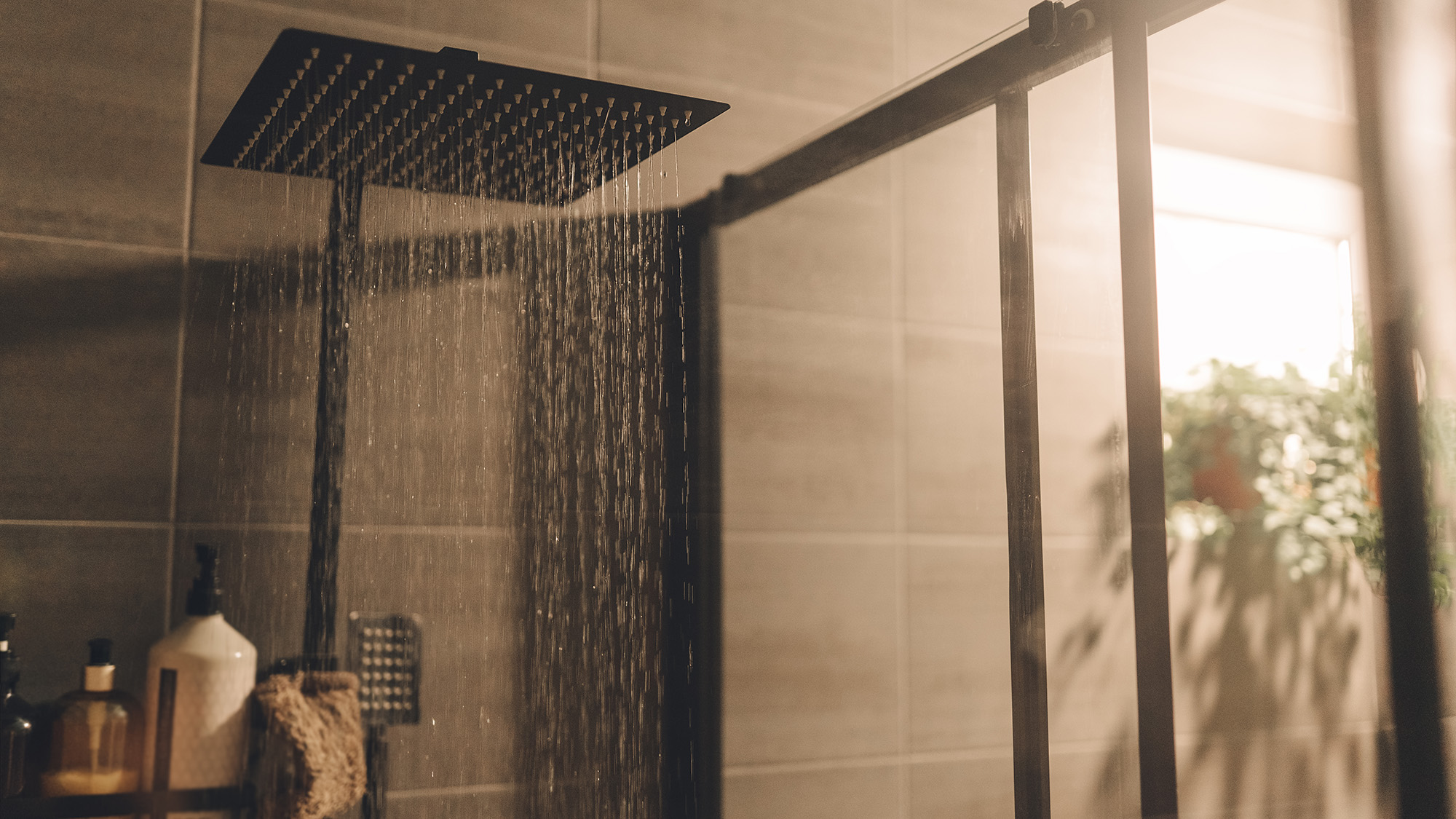 Shower steaming in bathroom