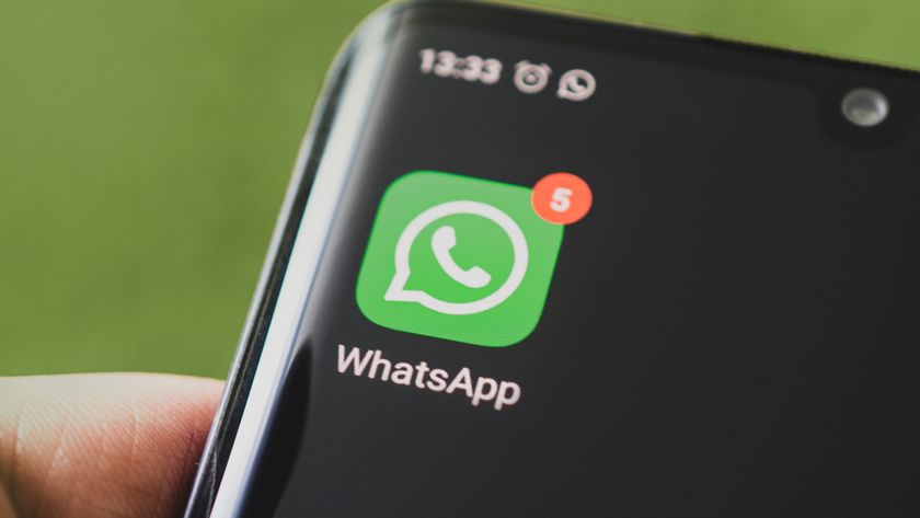 Icon of the WhatsApp, app on the screen of a black smartphone