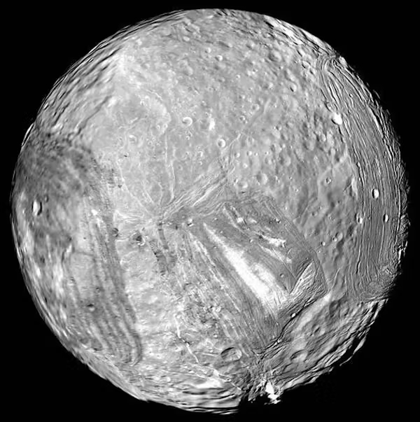 Uranus' icy moon Miranda wowed scientists during Voyager 2's 1986 encounter with its dramatically fractured landscapes.