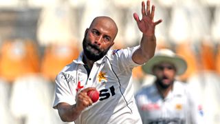 Sajid Khan bowling for Pakistan