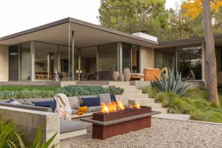 outdoor seating area with steel fire pit