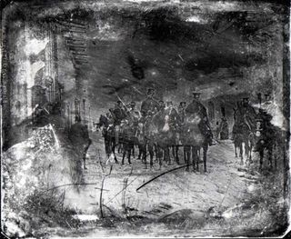A photo showing American general John E. Wool and his staff riding through Saltillo, Mexico, in early 1847 after his troops captured the city during the American-Mexican war.