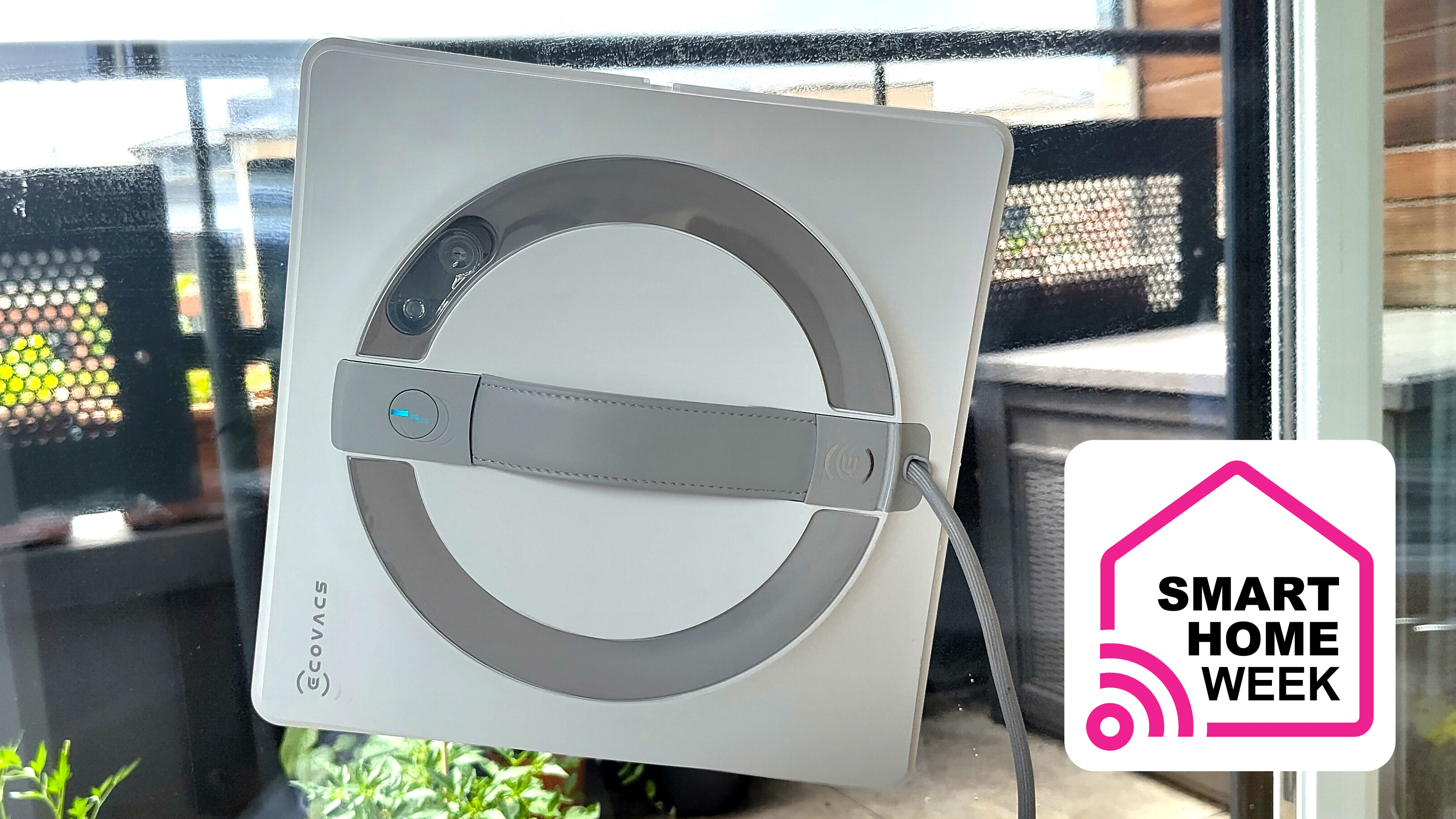 Ecovacs Winbot W2 Pro Omni on window