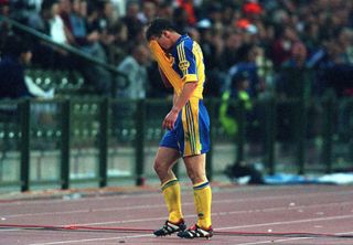 Sweden defender Patrik Andersson leaves the pitch after his red card against Belgium at Euro 2000.