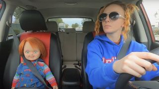 Kyra Elise Gardner driving with Chucky in Living With Chucky