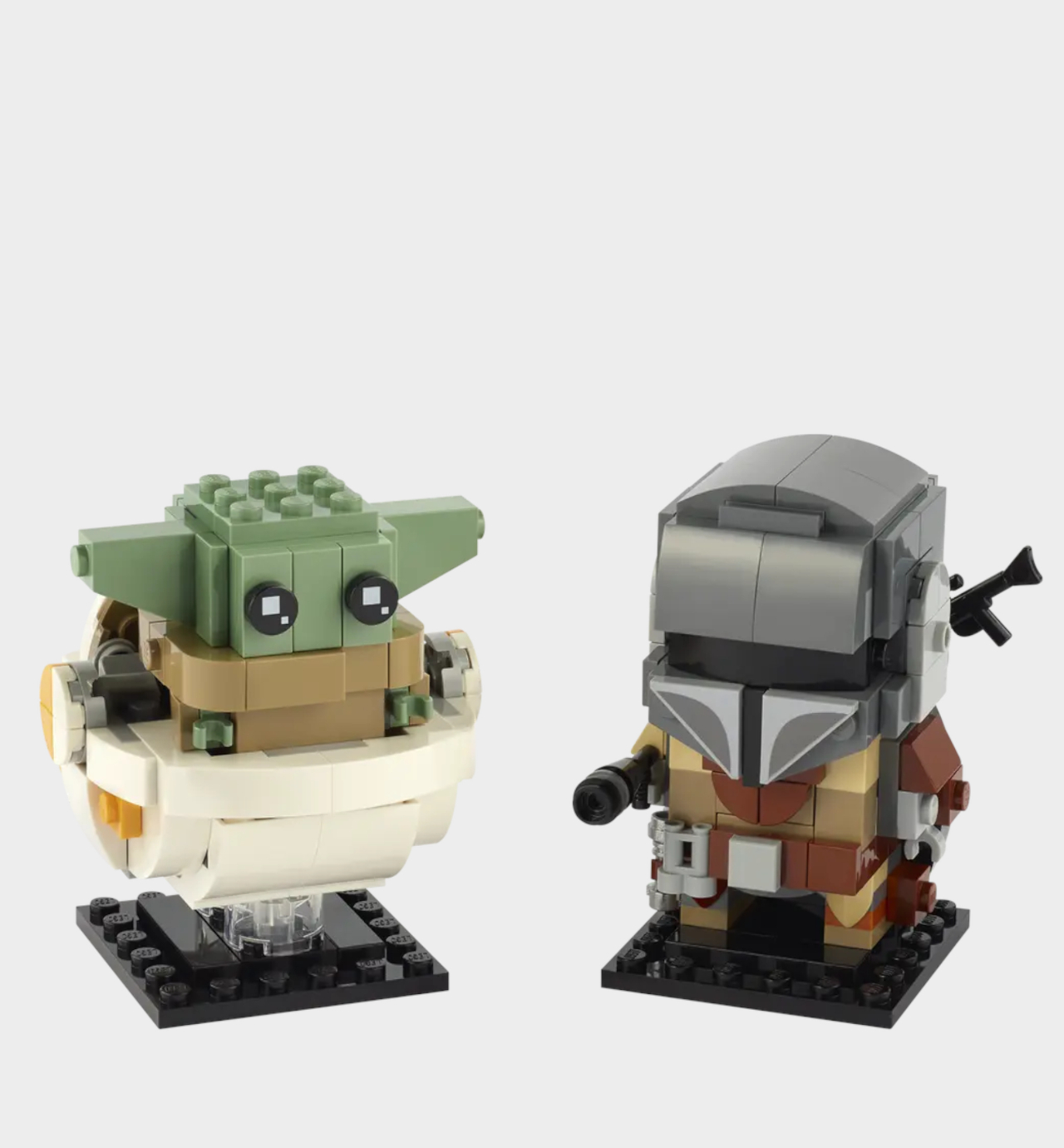 Lego Mandalorian and The Child figures on a plain background