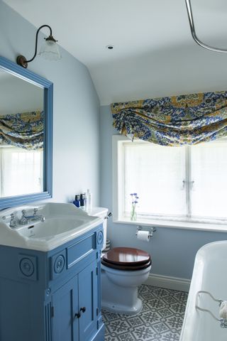 blue arts crafts style bathroom