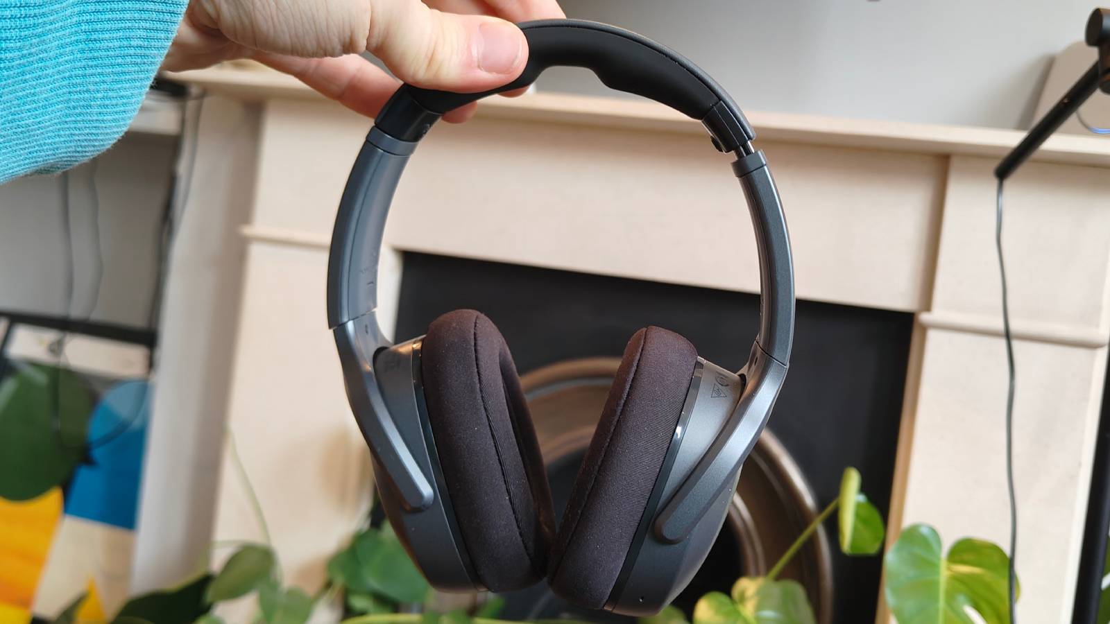 The Skullcandy Crusher 540 Active on a sofa.
