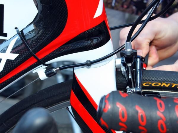 We still haven't found out where European mechanics find these little rubber bits to protect the frame's paint from housing rub.