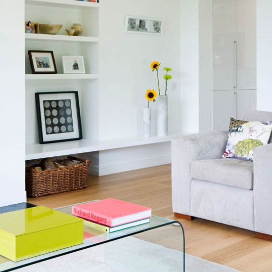 living room with wooden flooring sofa chair
