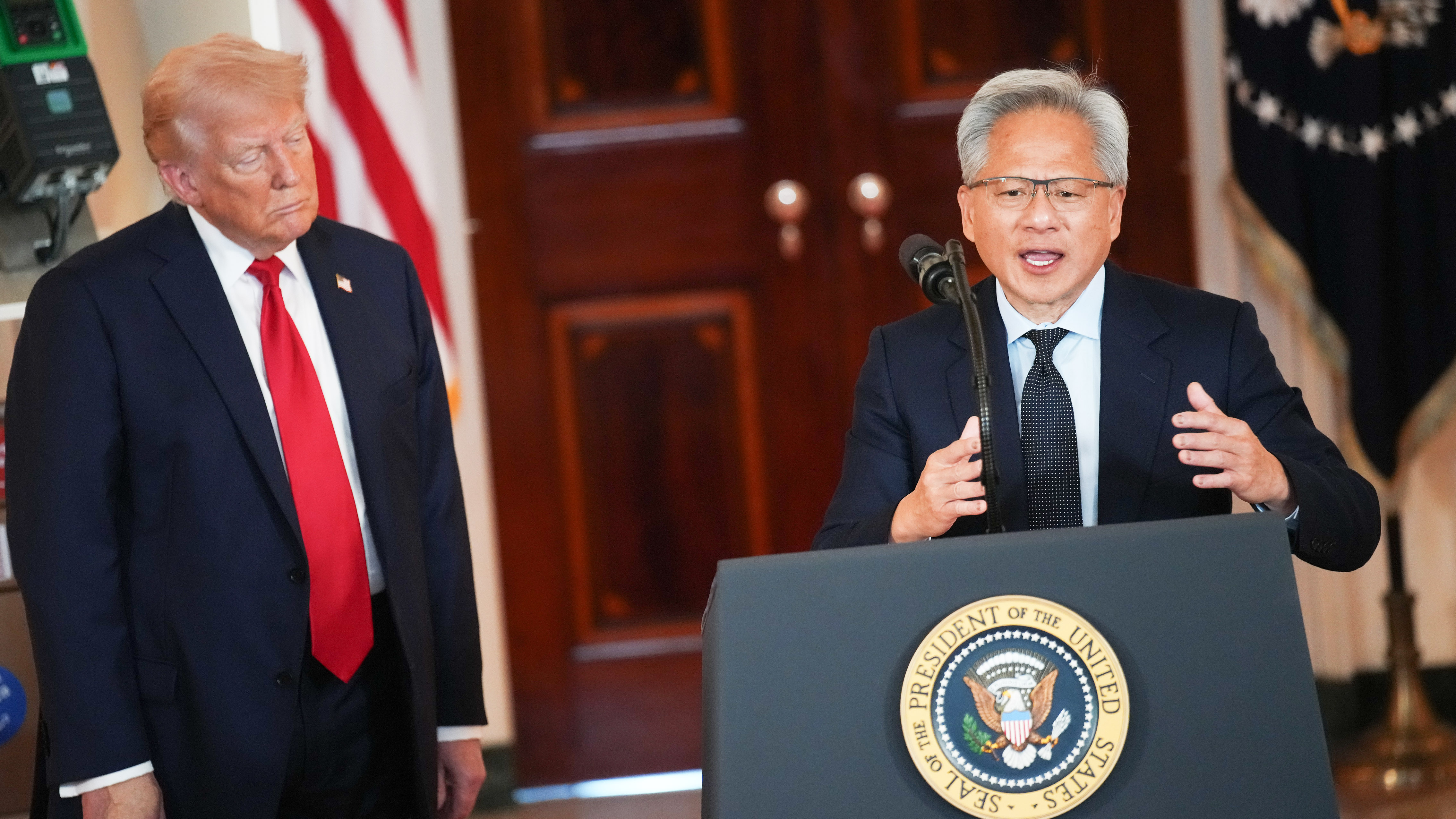 WASHINGTON, DC - APRIL 30: U.S. President Donald Trump listens as Nvidia CEO Jensen Huang speaks in the Cross Hall of the White House during an event on "Investing in America" on April 30, 2025 in Washington, DC. Trump was joined by CEOs to highlight companies and their investments in the United States during the event. (Photo by Andrew Harnik/Getty Images)