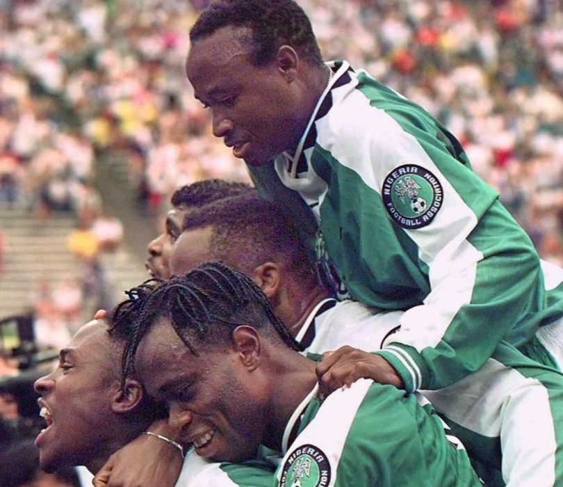 Nigeria players celebrate their late comeback to beat Brazil 4-3 in the semi-finals of the men's Olympic football tournament at the Atlanta Games in 1996.