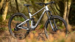 The Norco Optic C2 on a trail